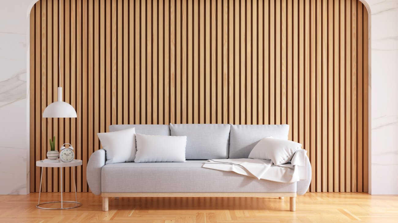 Gray sofa in living room interior with copy space for mock up, 3D rendering